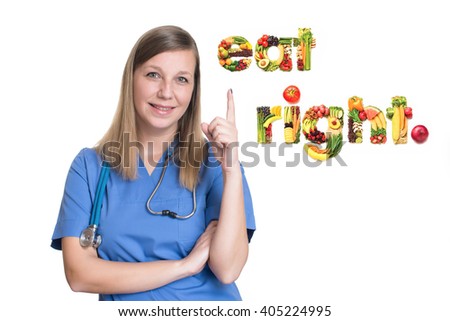 Female doctor pointing up one finger. Eat right Royalty-Free Stock Photo #405224995
