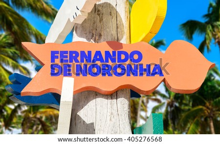 Fernando de Noronha signpost with palm trees