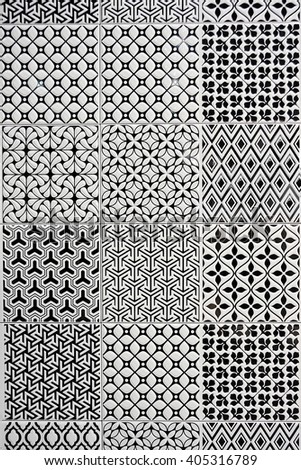 Ceramic tile with black and white geometric pattern, background, texture