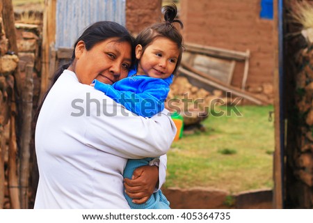 Happy aymara family Royalty-Free Stock Photo #405364735