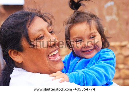 Happy aymara family Royalty-Free Stock Photo #405364774