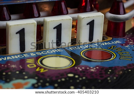 "Number 1" Drop Targets on Pinball Machine Royalty-Free Stock Photo #405403210