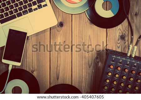Mixer, laptop and smartphone Royalty-Free Stock Photo #405407605