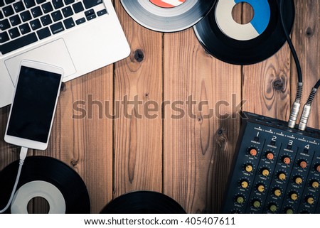 Mixer, laptop and smartphone Royalty-Free Stock Photo #405407611