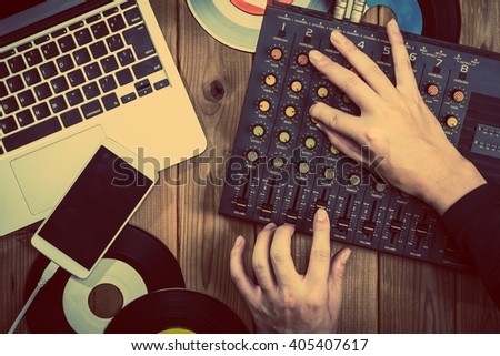 Mixer, laptop and smartphone Royalty-Free Stock Photo #405407617