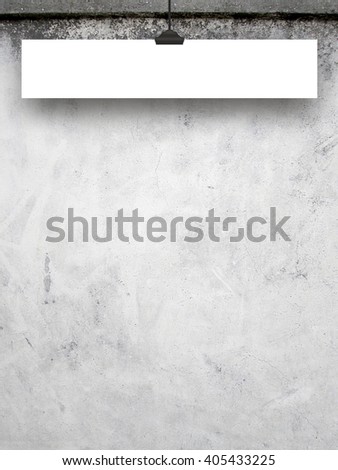 Close-up of one blank rectangular frame hanged by clip against grey concrete wall background
