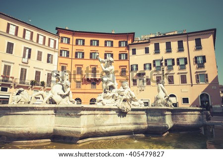 Piazza Navona, Neptune Fountain in summer day. Rome, Italy. Vintage stylized photo with tonal correction photo filter effect, instagram retro style