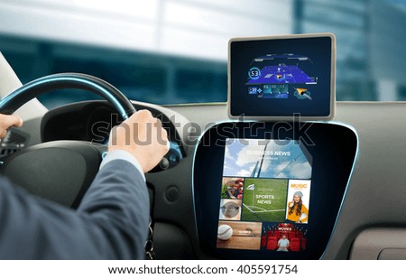transport, business trip, technology, navigation and people concept - close up of young man with gps navigator on tablet pc and on-board computer menu driving car