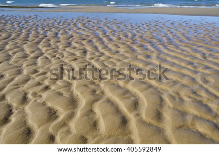 Waves and wind have created patterns in the sand at Sand Beach in Pictured Rocks National Lakeshore in Alger County, Michigan