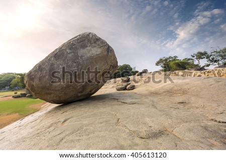 Krishna's butterball, the giant natural balancing rock in Mahabalipuram, Tamil Nadu, India Royalty-Free Stock Photo #405613120
