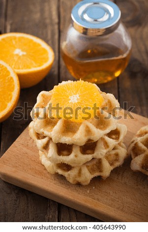 Traditional Belgium waffles and orange
