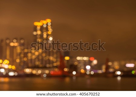 Abstract bokeh golden luxury cityscape seaside night light background