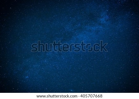 Milky way on the dark night sky. Stars on cosmos background