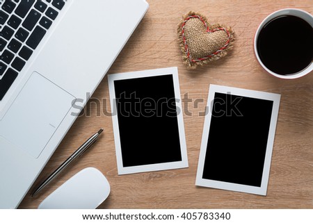 Blank photo frames on table