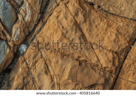 The surface of natural stone beach background.

