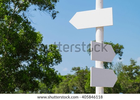 White arrow sign 
