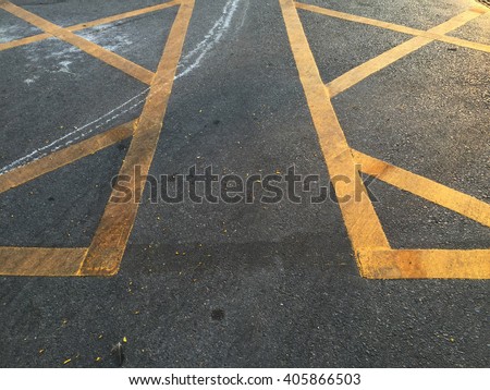 No parking yellow line cross zone.criss-cross yellow lines painted on the road