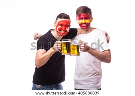 Spain and Turkey football fan drink beer on white background. European football fans concept.
