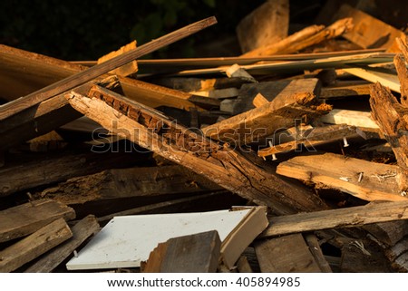 deconstructed and broken wooden boards on a heap Royalty-Free Stock Photo #405894985
