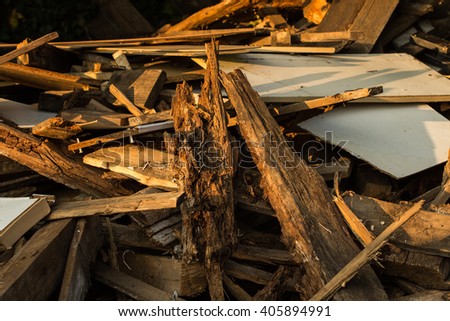 deconstructed and broken wooden boards on a heap Royalty-Free Stock Photo #405894991