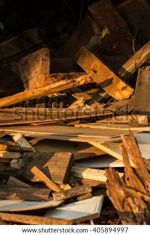 deconstructed and broken wooden boards on a heap Royalty-Free Stock Photo #405894997