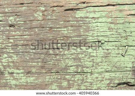 Old wooden of cracked green paint, copy space