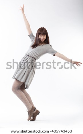 beautiful girl in motion on white backround