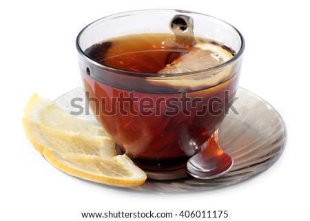 cup of black tea and a slice of lemon