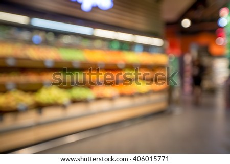 the shelves in the supermarket. store blurred background. vegetables in the supermarket. bokeh.