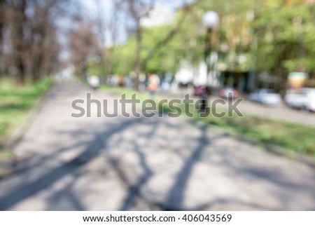 Blurred park background. blurry green grass. spring day. bokeh