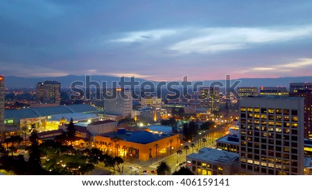 San Jose, Silicon Valley, view of downtown, the Tech Museum, McEnery Convention Center, Silicon Valley, and the Santa Cruz Mountains at sunset.