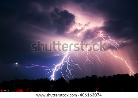 Lightning with dramatic clouds (composite image). Night thunder-storm Royalty-Free Stock Photo #406163074