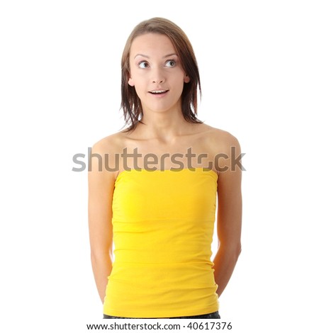 Surprised teen woman isolated on white background