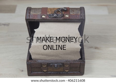 make money online is written on the brown torn paper in the treasure box