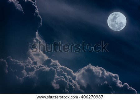 Attractive photo of a nighttime sky with clouds, bright full moon would make a great background. Nightly sky with large moon. Beautiful nature use as background. Outdoors.