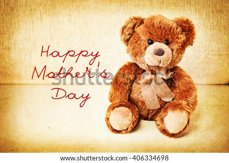 Teddy bear on a vintage table. Happy Mother's Day