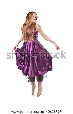 jumping girl in violet evening dress isolated on white