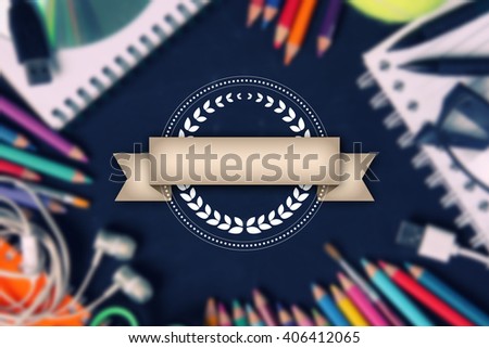 Decorative vintage label design with ribbon for copyspace, over abstract blurred image of school supplies - conceptual education background