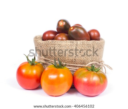 an image of organic tomatoes in basket