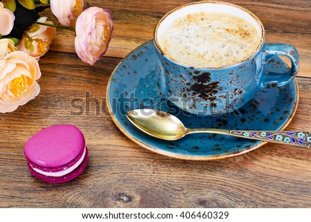Sweet  French Macaroons with Cofee Cup. Studio Photo