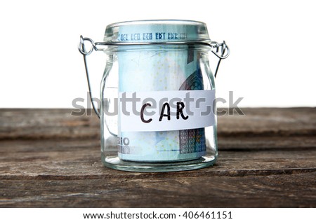 Jar for savings full of banknotes
