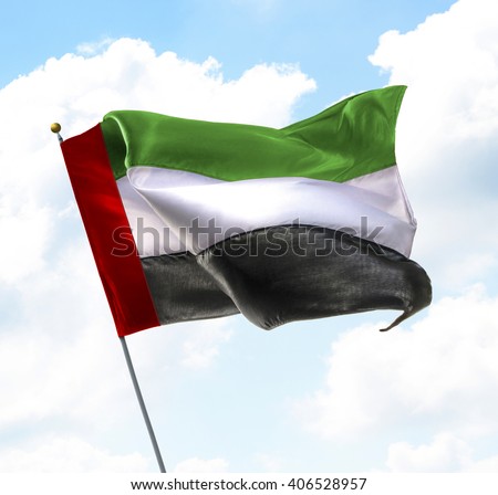 Flag of United Arab Emirates Raised Up in The Sky
