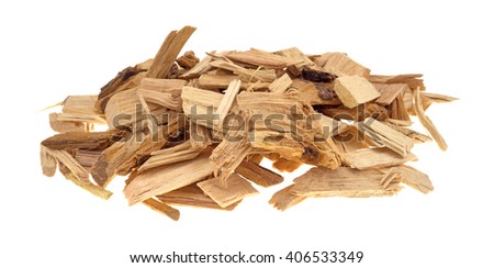 A small pile of hickory wood smoking chips for flavoring barbecue and grilled foods isolated on a white background. Royalty-Free Stock Photo #406533349