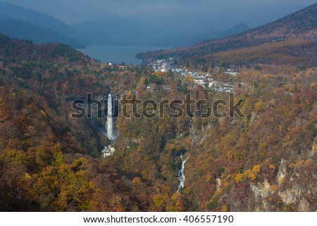 Nature of The Kegon Falls near Nikko, Japan surrounded by autumn color with Lake background