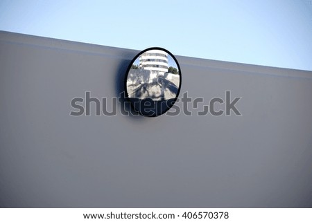 The close-up of a mirror on a wall edge / View mirror                   