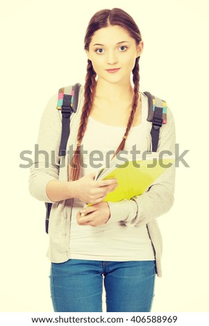 Teenager girl with school backpack.