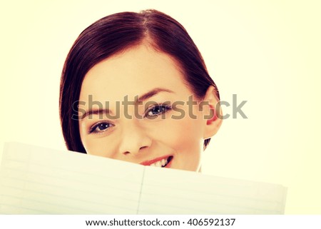 Smile young woman holding blank white banner