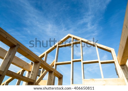 new house construction interior with exposed framing  Royalty-Free Stock Photo #406650811