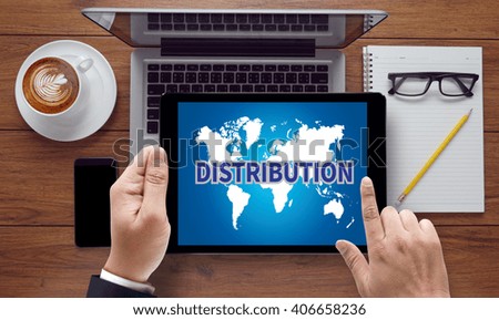 DISTRIBUTION , on the tablet pc screen held by businessman hands - online, top view