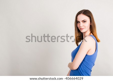 young girl in a shirt on a black background